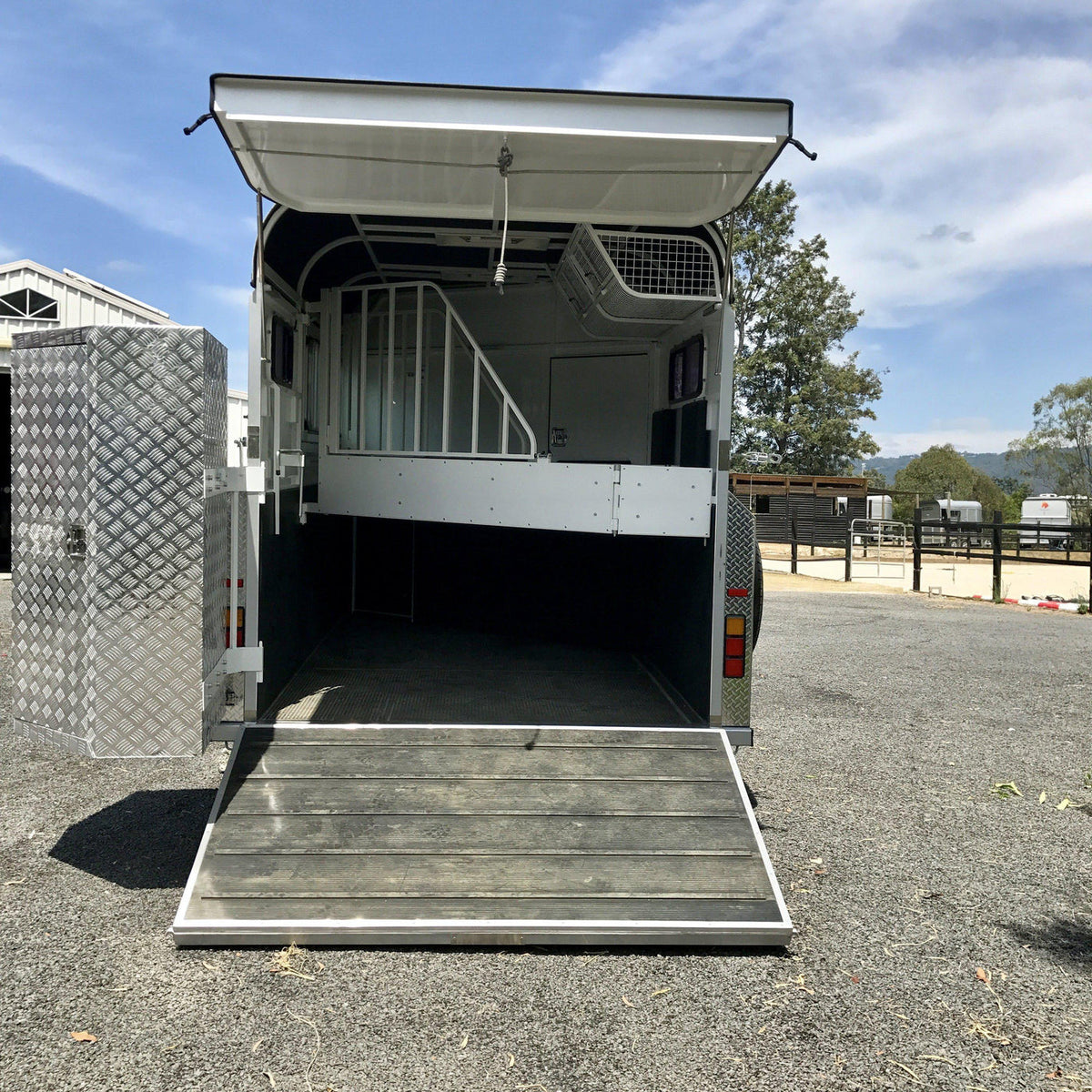 Square nose 2HAL-O SN WB 2.0 angle load horse float available in black, blue or gun metal with silver or white trim